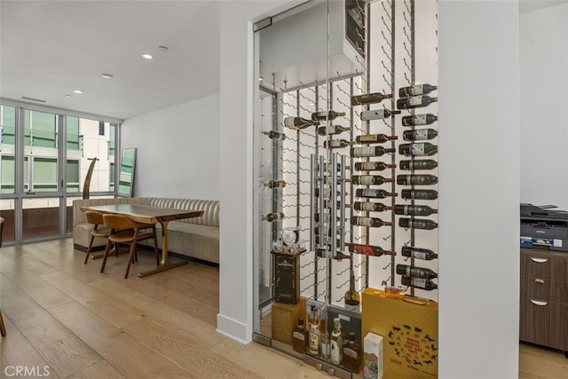 3306 Via Oporto, Newport Beach, CA 92663 - wine room with hardwood / wood-style floors, floor to ceiling windows, and recessed lighting