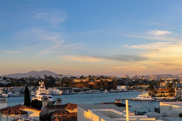 3306 Via Oporto, Newport Beach, CA 92663 - water view featuring a boat dock and mountains