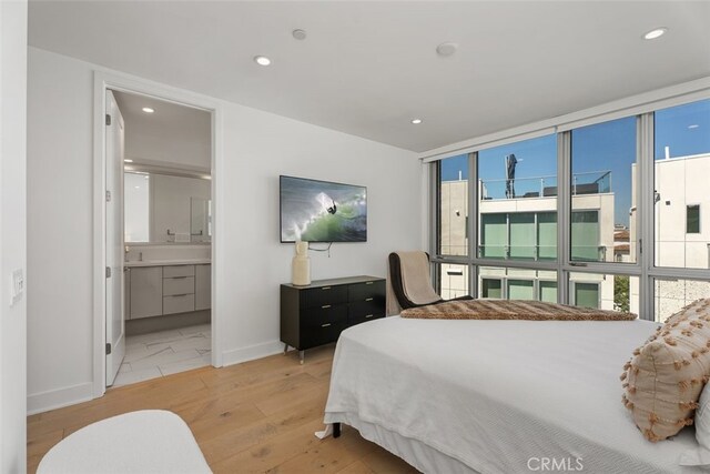 3306 Via Oporto, Newport Beach, CA 92663 - bedroom featuring light wood-style floors, multiple windows, recessed lighting, ensuite bathroom, and expansive windows