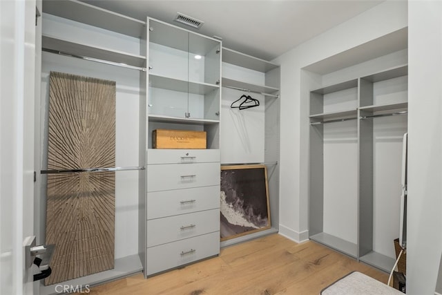 3306 Via Oporto, Newport Beach, CA 92663 - walk in closet featuring light wood-type flooring