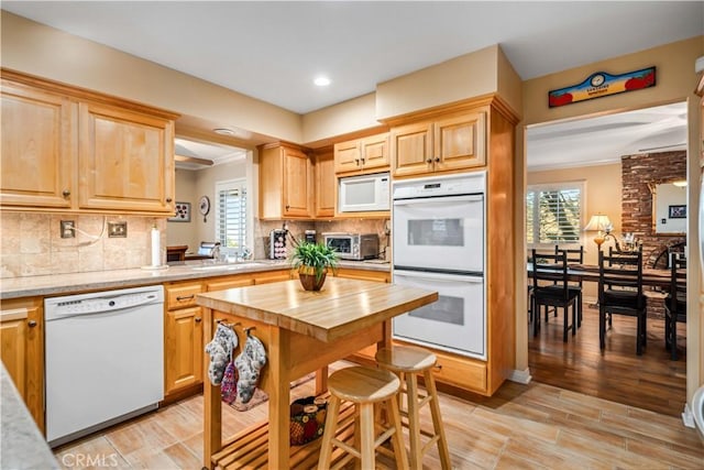 35870 Tierra Subida Ave, Palmdale, CA 93551 - kitchen with white appliances, butcher block counters, plenty of natural light, backsplash, and recessed lighting