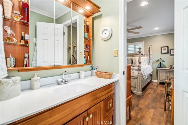 35870 Tierra Subida Ave, Palmdale, CA 93551 - bathroom featuring crown molding, vanity, ceiling fan, wood finished floors, and recessed lighting