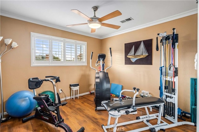35870 Tierra Subida Ave, Palmdale, CA 93551 - exercise room featuring a ceiling fan, wood finished floors, and ornamental molding