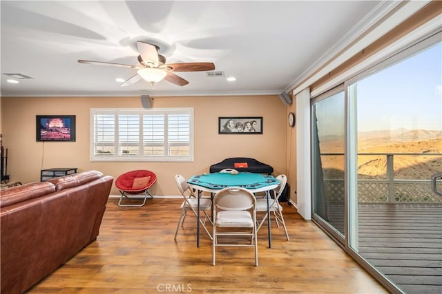 35870 Tierra Subida Ave, Palmdale, CA 93551 - playroom with crown molding, a ceiling fan, wood finished floors, recessed lighting, and a mountain view