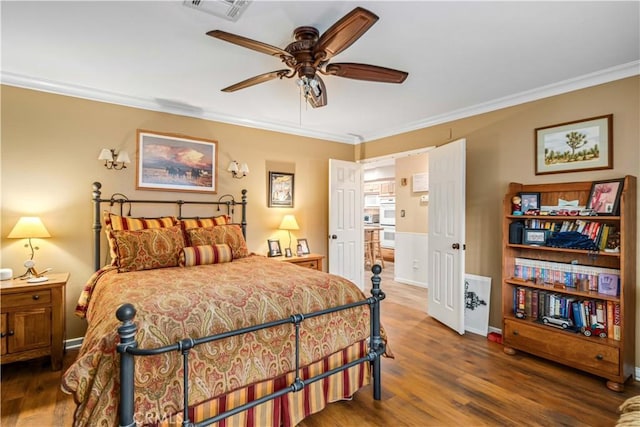 35870 Tierra Subida Ave, Palmdale, CA 93551 - bedroom featuring ornamental molding, wood finished floors, and a ceiling fan