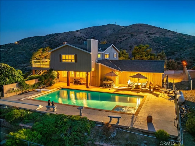 35870 Tierra Subida Ave, Palmdale, CA 93551 - swimming pool featuring a mountain view, a diving board, and a patio area