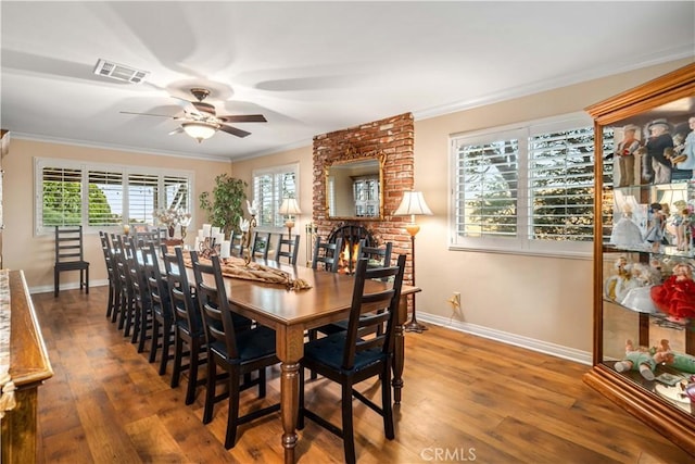 35870 Tierra Subida Ave, Palmdale, CA 93551 - dining space with ceiling fan, wood finished floors, and ornamental molding