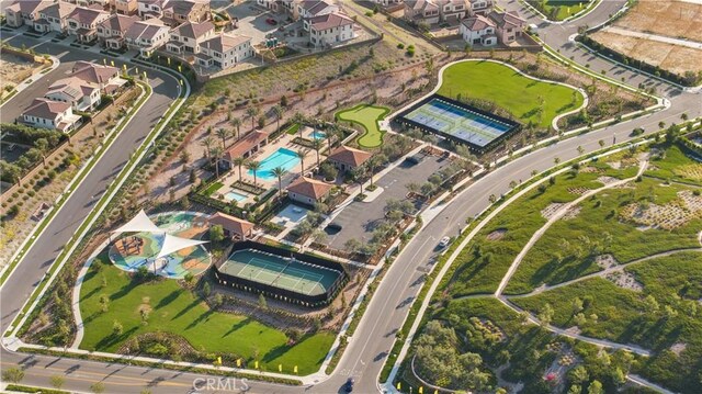 312 Brimwood, Irvine, CA 92618 - aerial view of property and surrounding area featuring nearby suburban area and a pool area