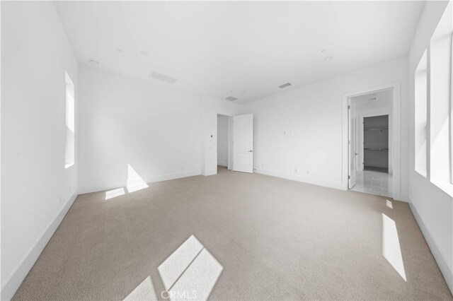 312 Brimwood, Irvine, CA 92618 - empty room featuring light carpet and baseboards