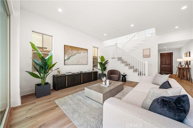 312 Brimwood, Irvine, CA 92618 - living area featuring stairway, recessed lighting, and wood finished floors