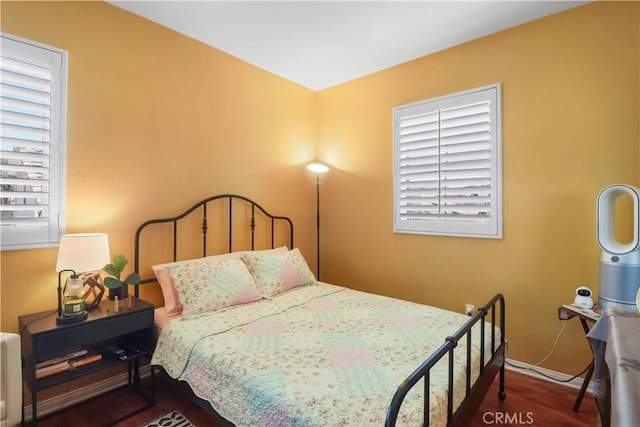 9044 Sylmar Ave, Panorama City, CA 91402 - bedroom with wood finished floors and baseboards