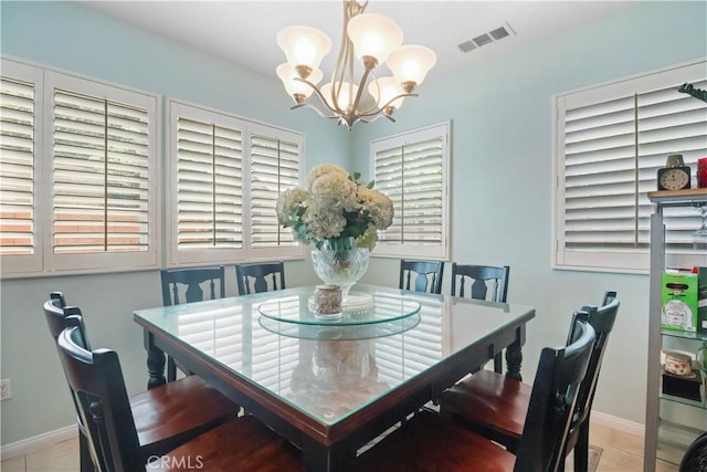 9044 Sylmar Ave, Panorama City, CA 91402 - dining area with a chandelier and baseboards