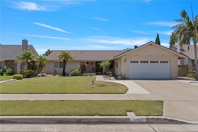 3186 N Hartman St, Orange, CA 92865 - ranch-style home featuring a garage, concrete driveway, and a front yard