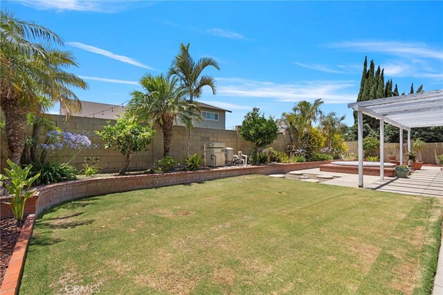 3186 N Hartman St, Orange, CA 92865 - fenced backyard featuring a patio area