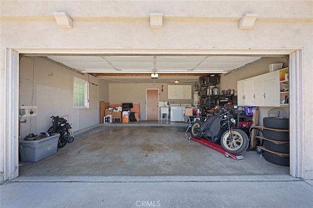 3186 N Hartman St, Orange, CA 92865 - garage with washer and clothes dryer and a garage door opener