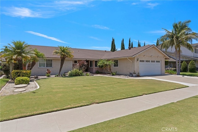 3186 N Hartman St, Orange, CA 92865 - ranch-style home with a garage, concrete driveway, and a front yard