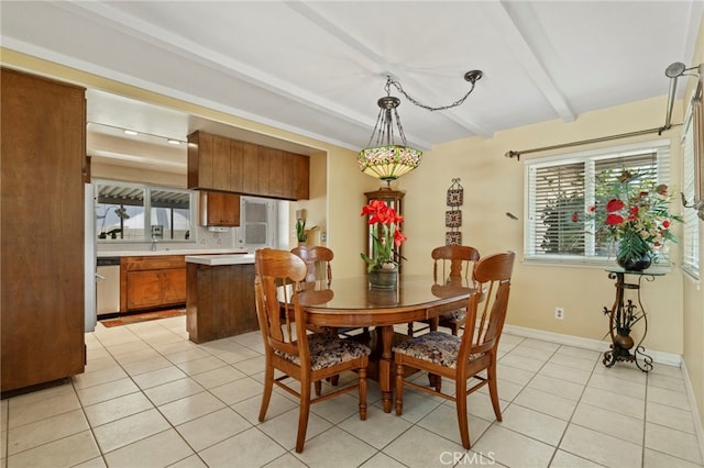 3186 N Hartman St, Orange, CA 92865 - dining area with light tile patterned flooring and beam ceiling