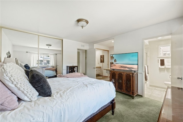 3186 N Hartman St, Orange, CA 92865 - carpeted bedroom featuring ensuite bathroom