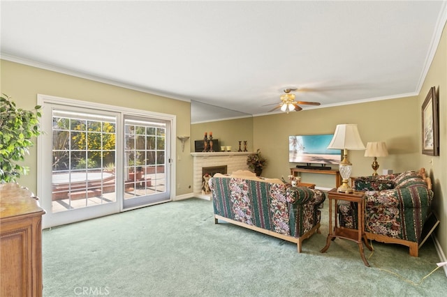 3186 N Hartman St, Orange, CA 92865 - carpeted living area featuring crown molding, a ceiling fan, and a brick fireplace