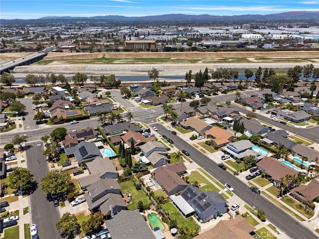 3186 N Hartman St, Orange, CA 92865 - aerial view of property and surrounding area with nearby suburban area and a mountain backdrop