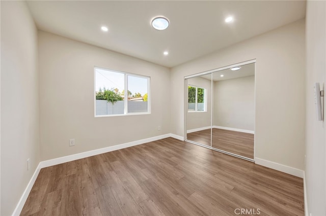 14625 Runnymede St, Van Nuys, CA 91405 - unfurnished bedroom featuring wood finished floors, recessed lighting, and a closet