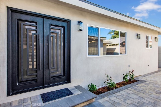 14625 Runnymede St, Van Nuys, CA 91405 - property entrance featuring stucco siding and french doors
