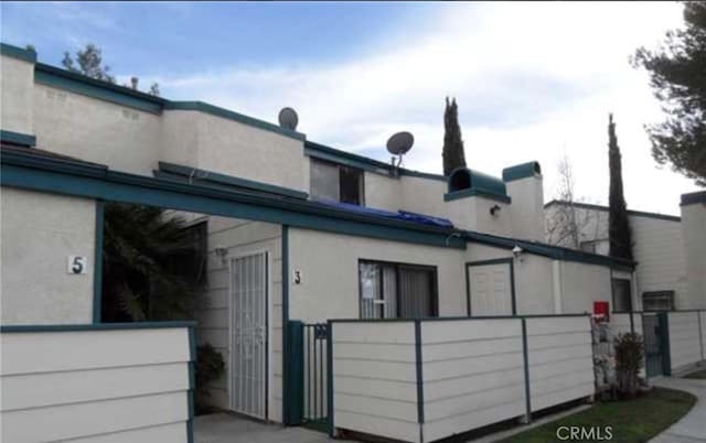 44460 15th St E Unit 3, Lancaster, CA 93535 - view of home's exterior with stucco siding