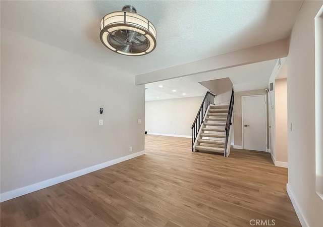 19237 Index St Unit 5, Porter Ranch, CA 91326 - below grade area featuring stairs and wood finished floors