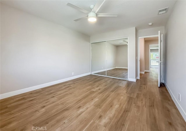 19237 Index St Unit 5, Porter Ranch, CA 91326 - unfurnished bedroom with a closet, light wood finished floors, and ceiling fan
