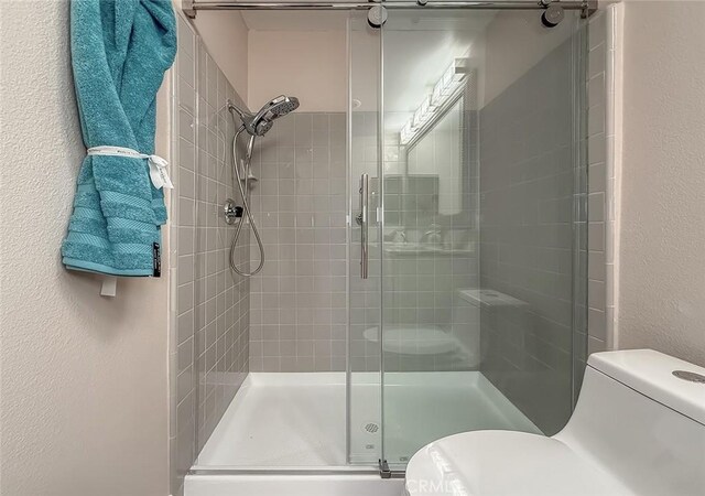 19237 Index St Unit 5, Porter Ranch, CA 91326 - full bathroom with a stall shower and a textured wall
