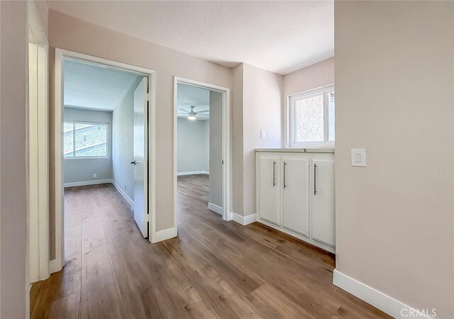 19237 Index St Unit 5, Porter Ranch, CA 91326 - corridor featuring wood finished floors and baseboards