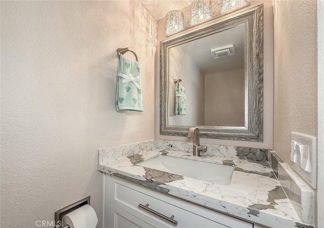 19237 Index St Unit 5, Porter Ranch, CA 91326 - half bath with vanity and a textured wall