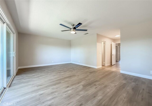 19237 Index St Unit 5, Porter Ranch, CA 91326 - empty room featuring light wood-style floors, ceiling fan, and a textured ceiling