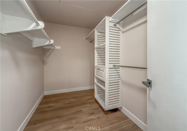 19237 Index St Unit 5, Porter Ranch, CA 91326 - spacious closet featuring wood finished floors