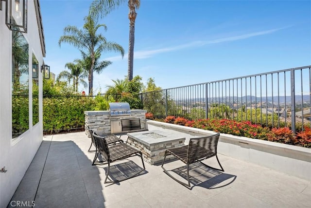 27705 Homestead Rd, Laguna Niguel, CA 92677 - view of patio featuring an outdoor kitchen and a fire pit