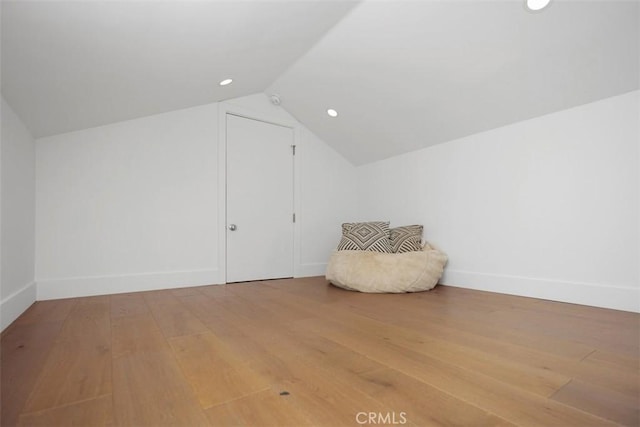 27705 Homestead Rd, Laguna Niguel, CA 92677 - unfurnished room with wood-type flooring, lofted ceiling, and recessed lighting