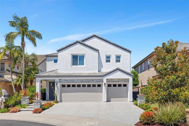 27705 Homestead Rd, Laguna Niguel, CA 92677 - traditional-style house with an attached garage, stucco siding, driveway, and a tiled roof