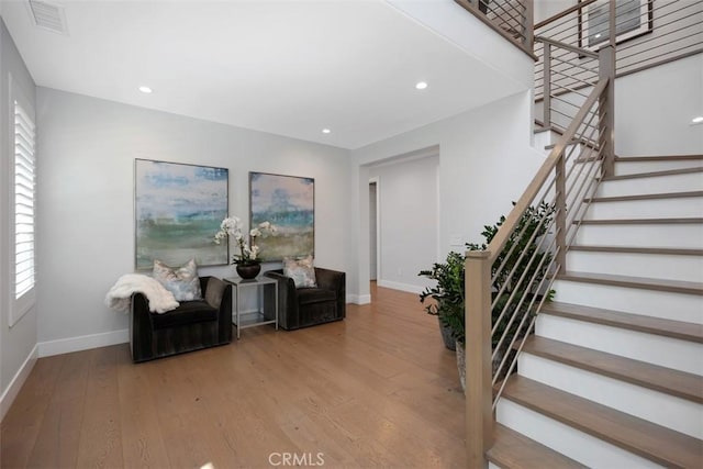 27705 Homestead Rd, Laguna Niguel, CA 92677 - sitting room featuring stairway, hardwood / wood-style flooring, plenty of natural light, and recessed lighting