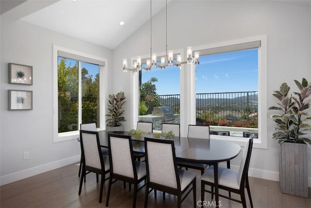 27705 Homestead Rd, Laguna Niguel, CA 92677 - dining room featuring a chandelier, wood finished floors, and high vaulted ceiling