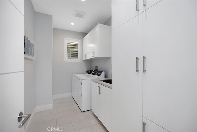 27705 Homestead Rd, Laguna Niguel, CA 92677 - washroom with cabinet space, washing machine and dryer, recessed lighting, and light tile patterned flooring
