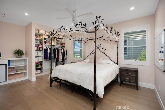 27705 Homestead Rd, Laguna Niguel, CA 92677 - bedroom featuring wood finished floors, a closet, recessed lighting, a spacious closet, and a ceiling fan