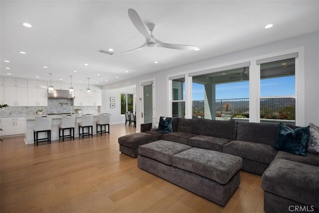 27705 Homestead Rd, Laguna Niguel, CA 92677 - living room with ceiling fan, plenty of natural light, light wood-type flooring, and recessed lighting