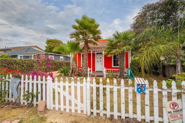 1780 Paso Robles St, Oceano, CA 93445 - view of front of house with a fenced front yard
