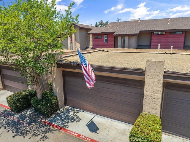 140 E El Norte Pkwy Unit 8, Escondido, CA 92026 - single story home featuring stucco siding, a garage, and concrete driveway