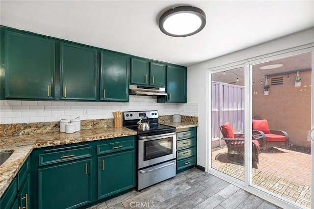 140 E El Norte Pkwy Unit 8, Escondido, CA 92026 - kitchen featuring electric stove, under cabinet range hood, backsplash, and green cabinets