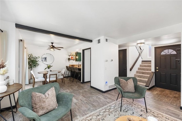 140 E El Norte Pkwy Unit 8, Escondido, CA 92026 - living room with stairs, wood finished floors, a ceiling fan, and beamed ceiling