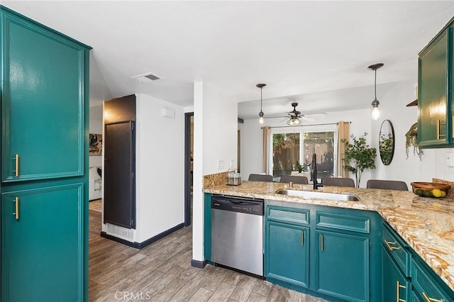 140 E El Norte Pkwy Unit 8, Escondido, CA 92026 - kitchen with dishwasher, light wood-style floors, ceiling fan, decorative light fixtures, and light stone countertops