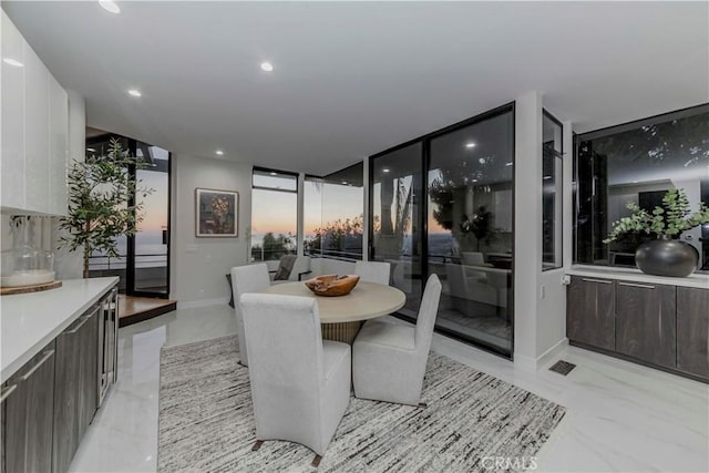 1195 La Mirada St, Laguna Beach, CA 92651 - dining room featuring light marble finish floors, recessed lighting, and expansive windows