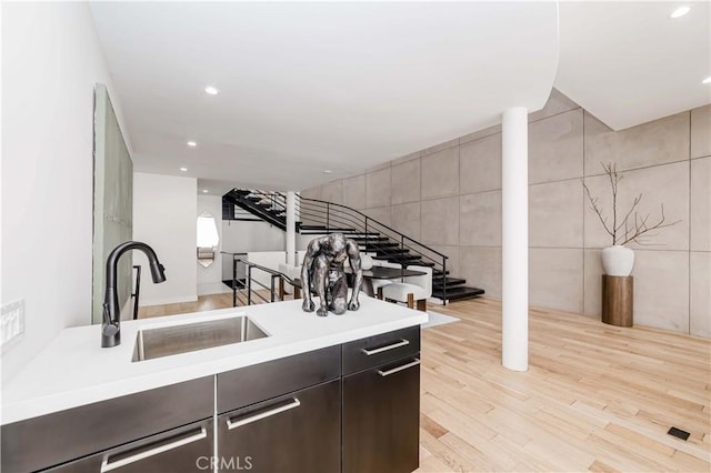 1195 La Mirada St, Laguna Beach, CA 92651 - kitchen with light countertops, light wood-type flooring, recessed lighting, and tile walls