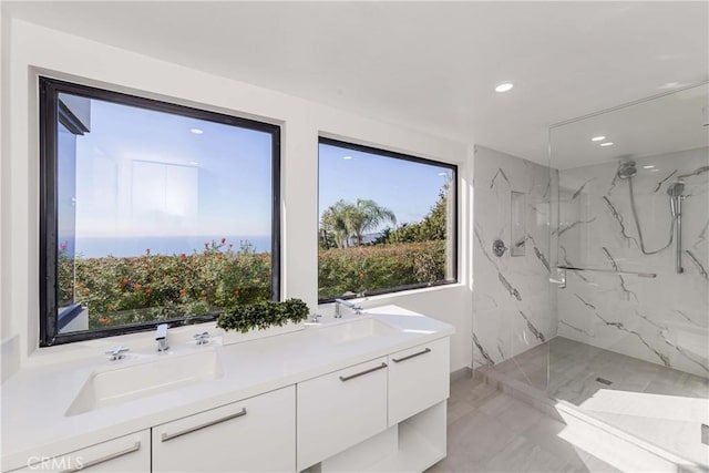 1195 La Mirada St, Laguna Beach, CA 92651 - bathroom with a marble finish shower, marble finish floors, recessed lighting, and double vanity